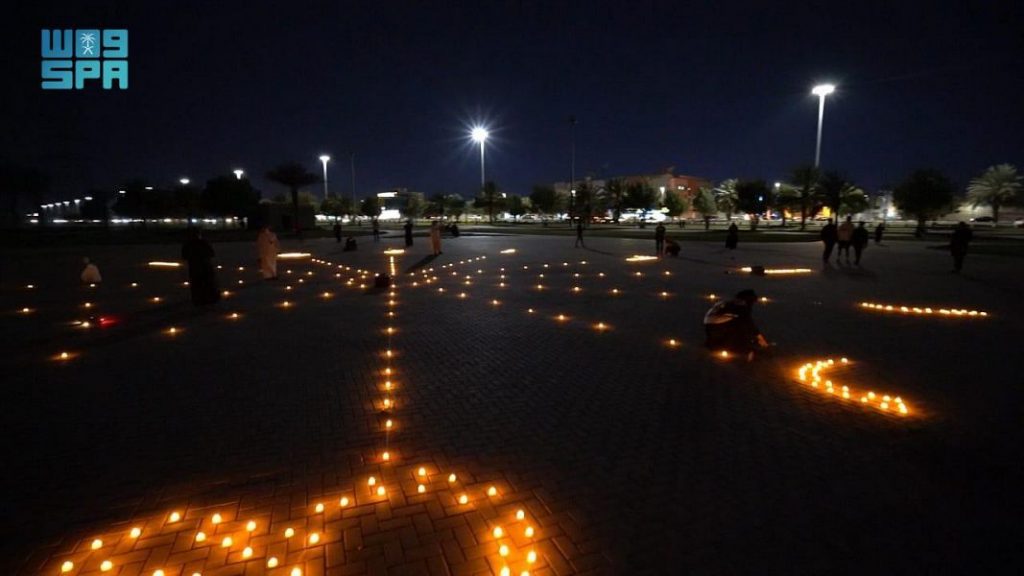 أمانة تبوك تضيء ممشى منتزه الأمير فهد بن سلطان بالشموع مشاركةً في ساعة الأرض